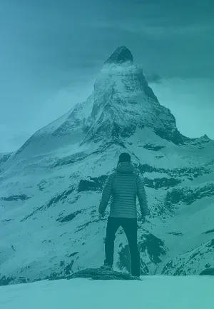 Person in front of mountain